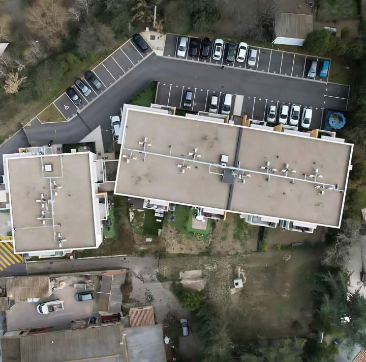 Étanchéité de toiture d’immeuble à Villeneuve-les-Béziers